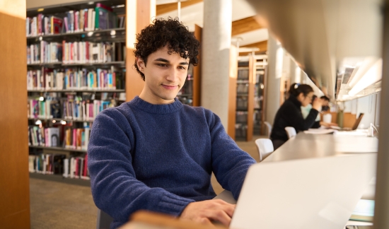 Male student in library