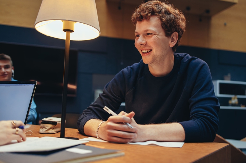 photo of male college student smiling